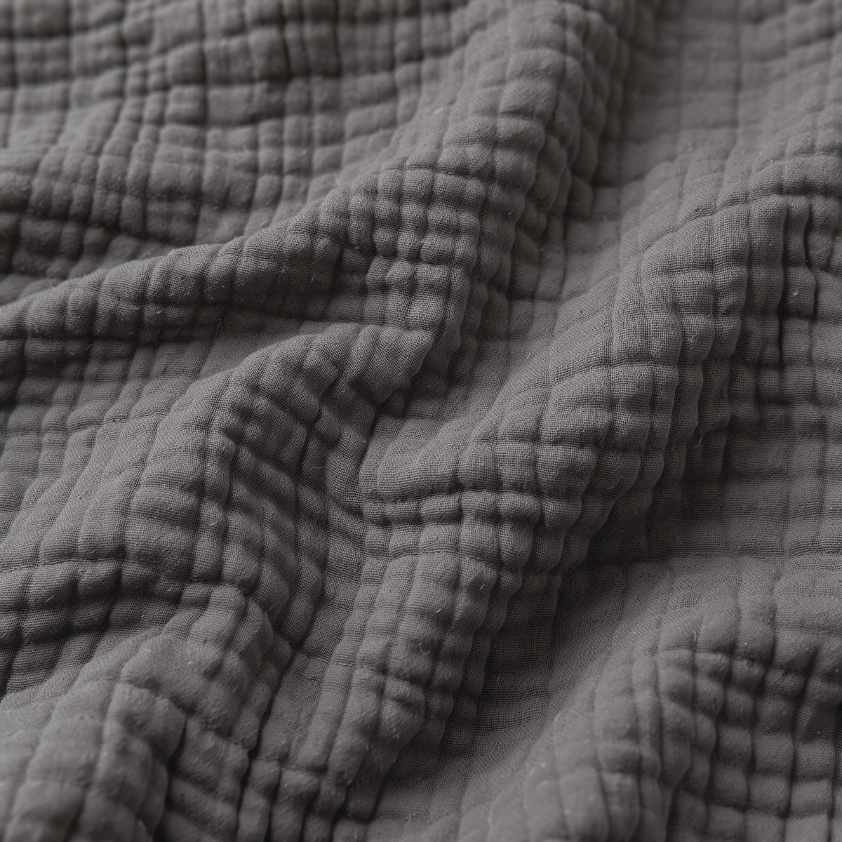 Close-up van de mousseline stof in Donkergrijs