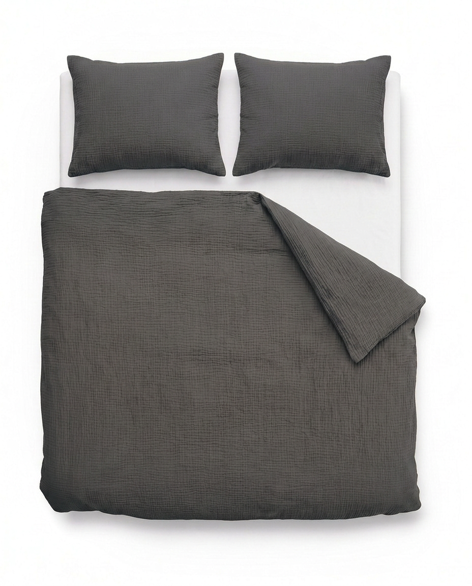 Mousseline dekbed Donkergrijs van bovenaf op bed